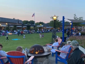 St. Clair Riverview Plaza Park with resident enjoying a summer event