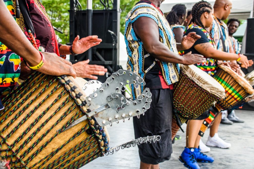 Photo of people playing African Drums