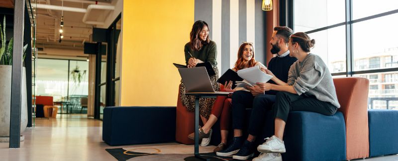 young professionals chatting in an office